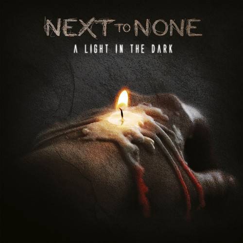 Okładka Next To None - A Light in the Dark